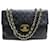CHANEL CLASSIC TIMELESS MAXI JUMBO HANDBAG IN BLACK QUILTED LEATHER BAG  ref.393324