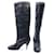 Chanel boots in black leather with patent toes & bow & silver chain trim  ref.398722