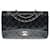 Superb Chanel Timeless Medium lined flap handbag in black quilted lambskin, Garniture en métal argenté Leather  ref.412344