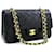 Chanel 2.55 sac à bandoulière à chaîne moyenne à rabat doublé en cuir d'agneau noir  ref.434080
