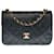 Timeless Magnífico bolso bandolera Chanel Classique Flap bag en piel de cordero acolchada negra, guarnición en métal doré Negro Cuero  ref.438809