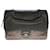L'original et pratique Sac Chanel Classique Flap bag en cuir semi-matelassé gris, garniture en métal argent vieilli  ref.440077