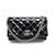 Timeless CHANEL MINI CLASSIC FLAP HANDBAG PATENT LEATHER QUILTED CROSSBODY Black  ref.440844