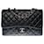 Le Majestueux Chanel Timeless Jumbo Flap bag shoulder bag in black quilted lambskin, Garniture en métal argenté Leather  ref.464481