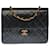 Timeless Splendid Chanel Classique Pochette Bolsa de ombro em couro matelassê preto, garniture en métal doré  ref.468968