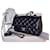 Chanel Mini sac classique à rabat Cuir Noir  ref.483545