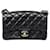 Mini borsa rettangolare con patta trapuntata Chanel in pelle di agnello nera Nero  ref.488642