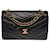 Timeless Beautiful Chanel Classique Flap bag handbag in black herringbone quilted lambskin, garniture en métal doré Leather  ref.495303