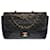 Sublime Chanel Timeless/Classique Flap bag in black quilted lambskin, garniture en métal doré Leather  ref.495327