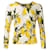 Dolce & Gabbana Jersey de cuello de pico de seda y cachemir con estampado de limones color crema Amarillo Cachemira Lana  ref.495357