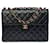 Excepcional bolsa vintage Chanel Timeless Jumbo single Flap bag em pele de cordeiro acolchoada preta, garniture en métal doré Preto Couro  ref.504246