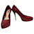 Gucci High heeled patent pumps in dark red with supporting platform Patent leather  ref.513600