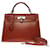Hermès Exceptional & Rare Hermes Kelly bag 32cm saddle strap in brick red box leather , palladium silver metal trim  ref.516262