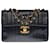 Timeless Majestuoso bolso de mano Chanel Jumbo single flap bag en piel de cordero acolchada negra, costuras verticales, adornos de metal dorado Negro Cuero  ref.517427