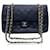 Timeless Chanel Solapa forrada clásica atemporal acolchada negra vintage 2.55 Bolso Negro Cuero  ref.520243