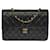 Timeless Wunderschöne mittelgroße Chanel Classic Flap Bag Handtasche aus schwarzem, gestepptem Lammleder, garniture en métal doré  ref.521125