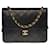 Timeless Espléndido bolso de mano Chanel Classic con solapa en cuero acolchado negro, guarnición en métal doré  ref.521137
