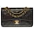 A cobiçada bolsa Chanel Timeless 23 cm com aba forrada em couro marrom, garniture en métal doré  ref.523656