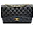 Timeless Chanel Handtaschen Schwarz Leder  ref.523951