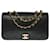 Magnifique Sac à main Chanel Classique full flap en cuir matelassé noir, garniture en métal doré  ref.525599