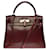 Hermès Splendid Hermes Kelly handbag 28 returned shoulder strap in red box leather H, gold plated metal trim  ref.525612