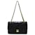 Bolso con solapa forrado en piel de cordero clásico negro pequeño de Chanel Cuero  ref.528314
