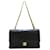 Chanel Black Classic Flap Bag forrada de piel de cordero mediana Negro Cuero  ref.534191