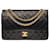 Sublime Chanel Timeless/Classic handbag 27 cm in black quilted leather, garniture en métal doré Lambskin  ref.540055