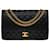 Sublime Chanel Timeless/Classic handbag 27 cm in black quilted leather, garniture en métal doré Lambskin  ref.540720