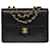 Lovely Chanel Timeless/Classique Mini Flap bag handbag in black quilted lambskin, garniture en métal doré Leather  ref.545544