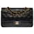 The coveted Chanel Timeless Medium bag 25 cm with lined flap in black leather, garniture en métal doré Lambskin  ref.552232