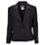 The iconic Chanel suit jacket in black tweed  ref.566124