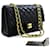 Chanel 2.55 sac à bandoulière à chaîne moyenne à rabat doublé en cuir d'agneau noir  ref.569185