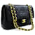 Chanel 2.55 Bolso de hombro con cadena y solapa forrada Bolso de piel de cordero negro Cuero  ref.569187