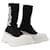 Alexander Mcqueen Zapatillas deportivas Tread Slick en tejido blanco y negro Impresión de pitón  ref.583854