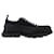 Alexander Mcqueen Tread Slick Sneaker in Black Leather Cloth  ref.593079