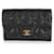 Carteira porta-cartões com aba de caviar acolchoada preta Chanel Preto Couro  ref.617619