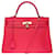 Exceptional Hermès Kelly handbag 35 reverse Togo leather shoulder strap Rose lipstick , gold plated metal trim Pink  ref.618956