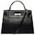 Hermès Splendide Sac à main Hermes Kelly sellier 32 cm bandoulière en cuir box noir, garniture en métal plaqué or  ref.619035