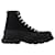 Alexander Mcqueen Tread Slick Boots in Black Leather Cloth  ref.622866