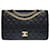 Schöne Chanel Timeless/Classic Handtasche 27cm mit gefütterter Klappe aus marineblauem, gestepptem Leder, garniture en métal doré  ref.626761