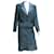 Chanel 02Un ensemble veste/jupe en tweed à bordure en cuir Laine Bleu Bleu Marine  ref.630310
