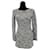 Chanel - 94Une robe en tricot à sequins transparents - Noir et blanc Laine  ref.630323