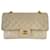 Timeless Chanel solapa forrada clásica piel de cordero mediana herrajes dorados atemporal beige vintage Cuero  ref.630619
