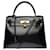 Hermès Stunning Hermes Kelly handbag 28cm saddler shoulder strap in black box leather, gold plated metal trim  ref.632090