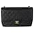 Bolsa Chanel Black acolchoada Caviar Jumbo Classic forrada com aba Preto Couro  ref.637006