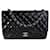 Bolsa Chanel Black acolchoada de couro envernizado Jumbo Classic com aba simples Preto  ref.637235
