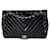Bolsa Chanel Black Chevron acolchoada couro envernizado Jumbo Classic com aba simples Preto  ref.637290