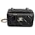 Vanity Bolsa de penteadeira Chanel preta acolchoada de pele de cordeiro elegante Preto Couro  ref.639502