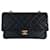 Chanel classique rabat doublé en cuir d'agneau moyen matériel doré intemporel vintage noir  ref.652659